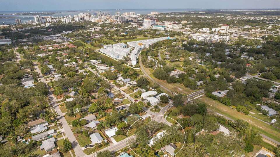 Aerial view of property, downtown Sarasota and Gulf of America. Walking dinstance to the Legacy Trail
