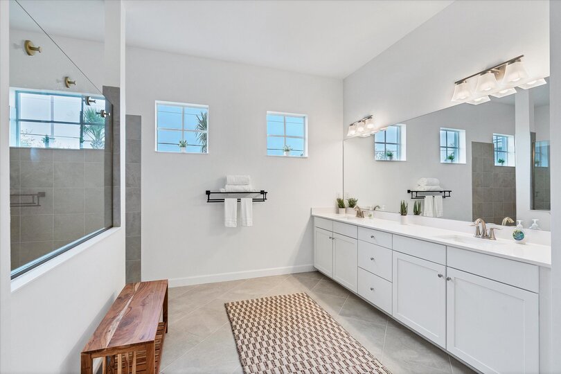 The primary bathroom has a huge walk-in shower