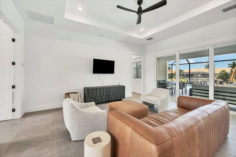 Bright, open living space. Ample seating and 50-inch Smart TV with HD antenna