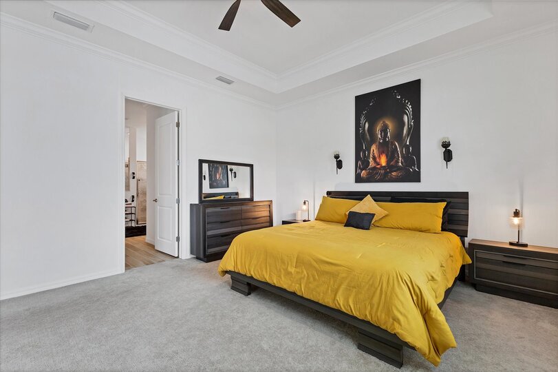 Primary bedroom with king bed and en suite