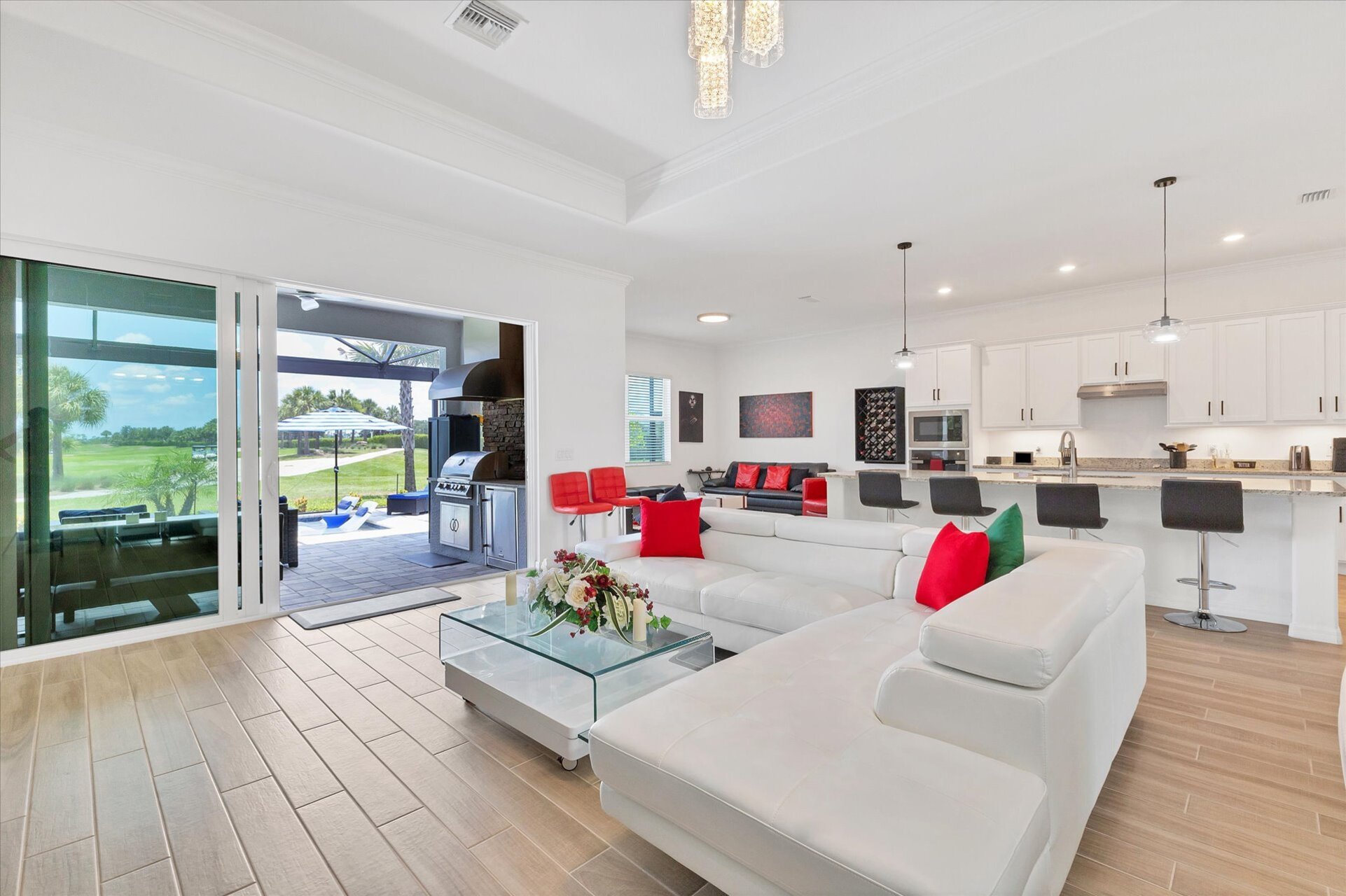 Bright, open living space overlooking the private pool