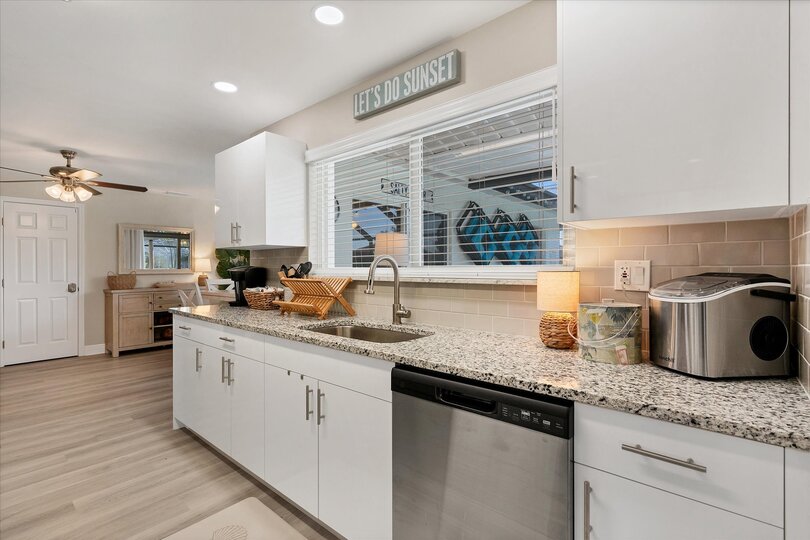 Beautiful, fully-equipped kitchen with stainless-steel appliances