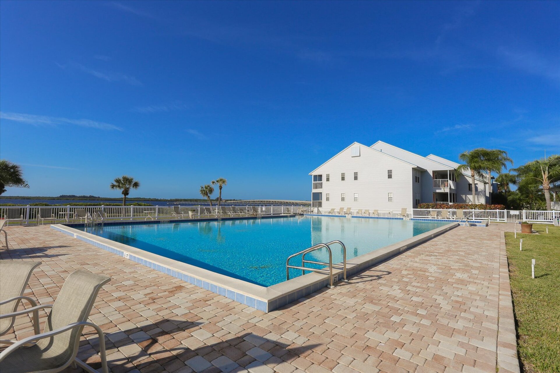 Community pool overlooks the river