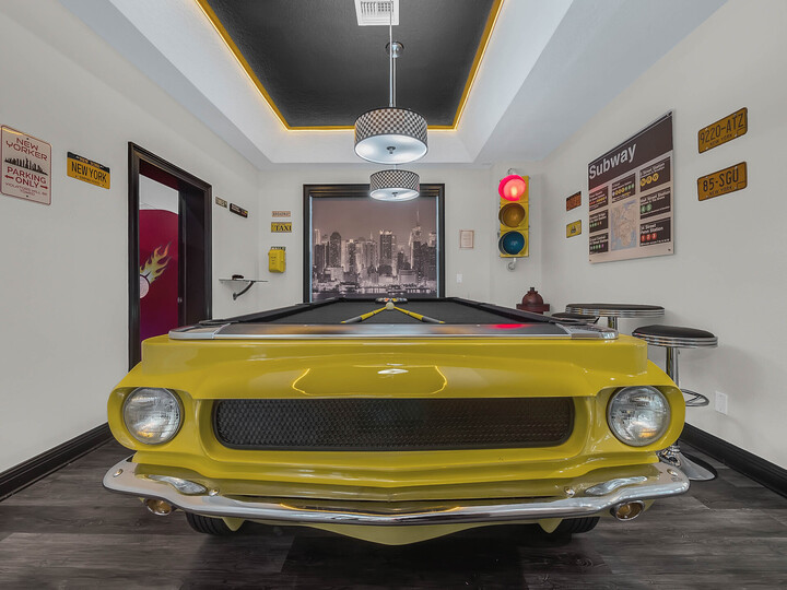 The pool table is an authentic Ford Mustang