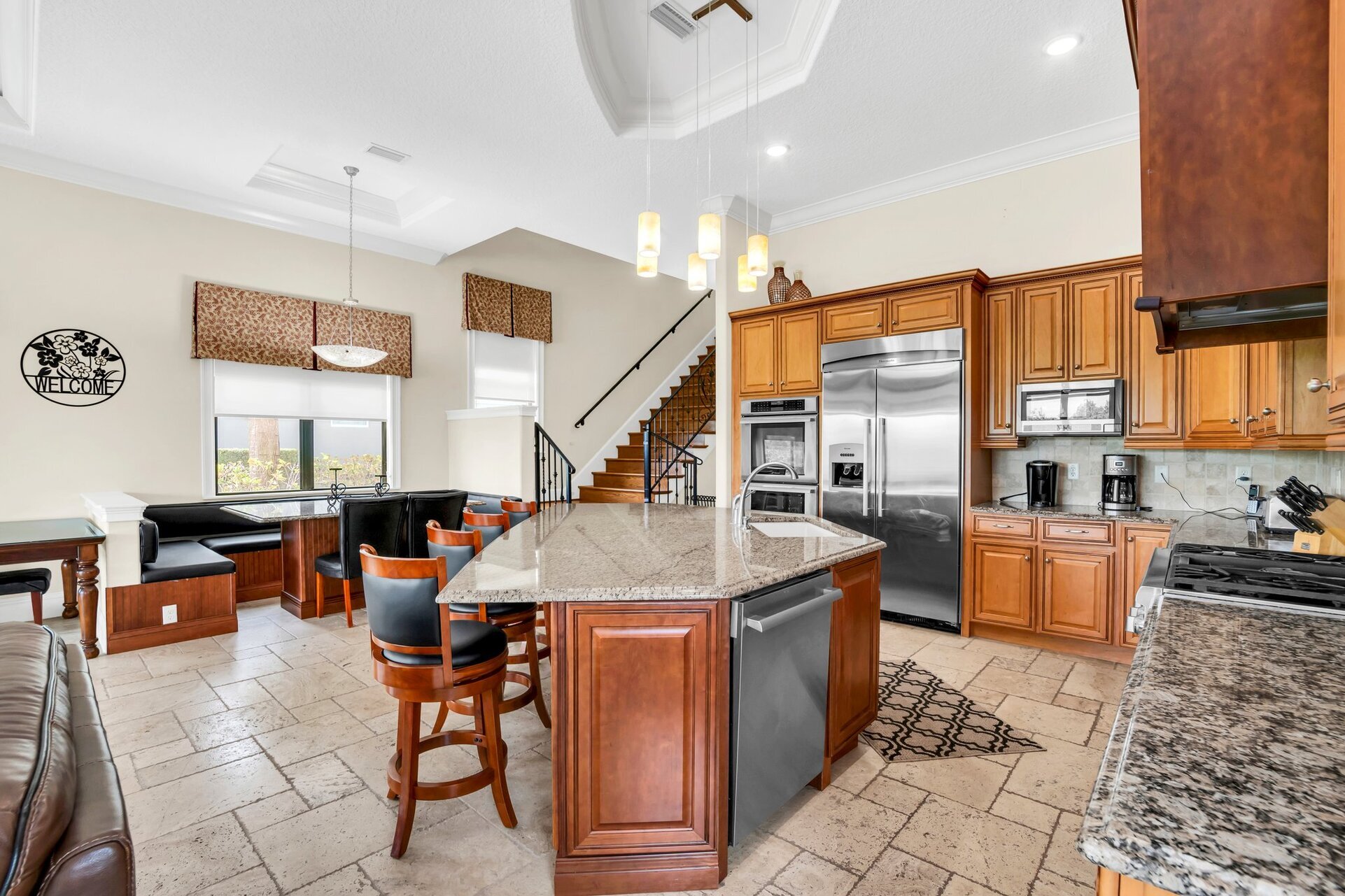 Sit at the breakfast bar and eat your breakfast in this large open kitchen