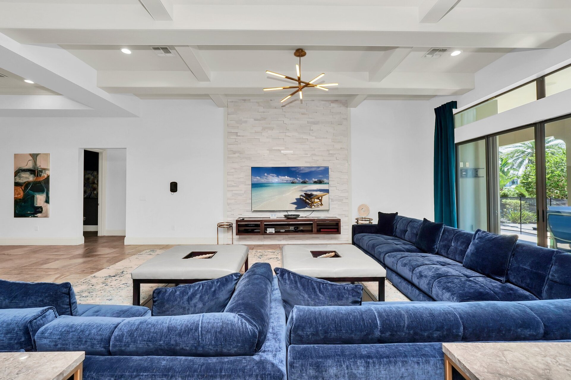 The living room TV has an Apple TV 2 installed. Play games with the fun apps or sign-in to your Netflix account to watch your favorite TV series