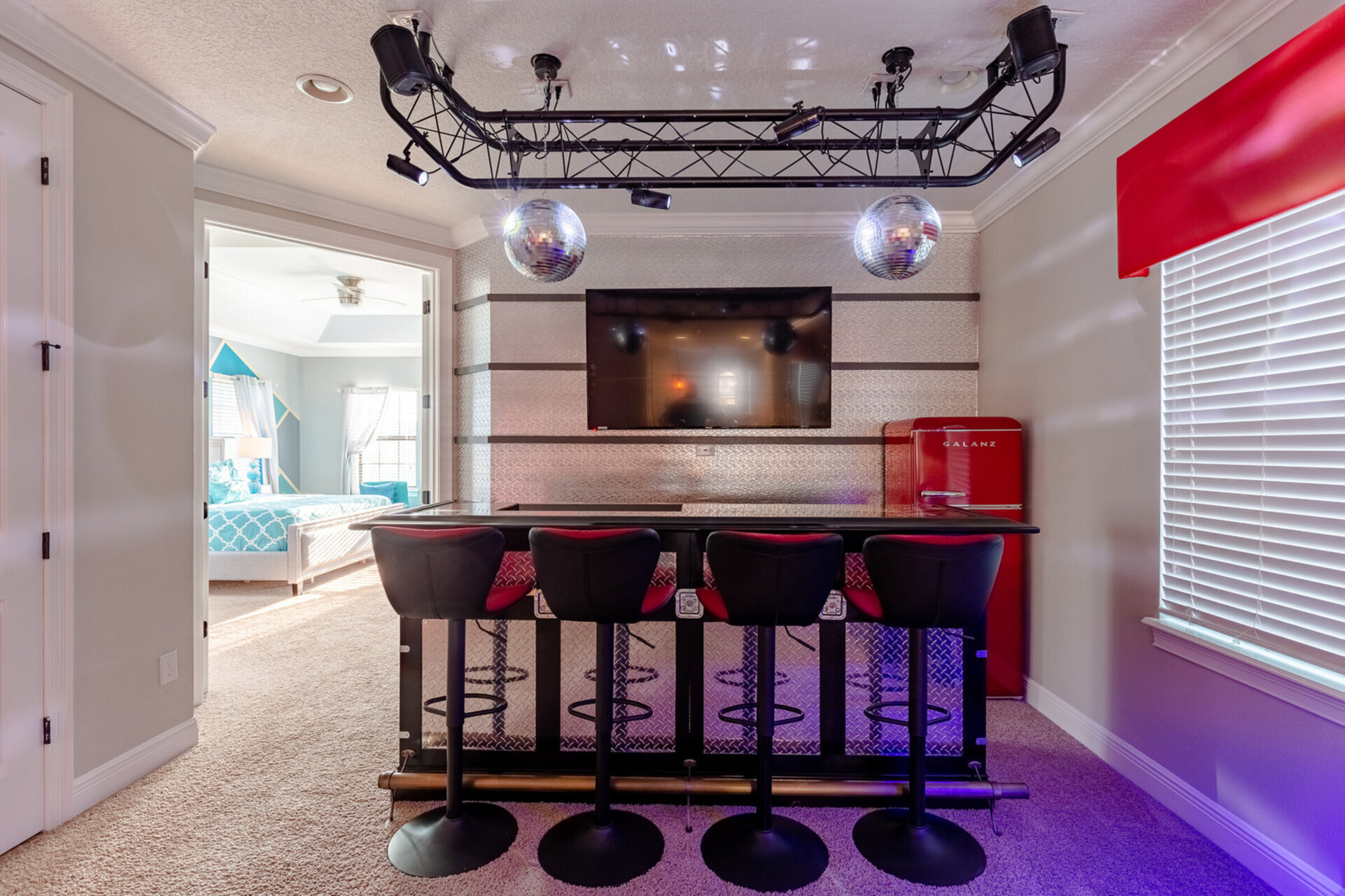 Enjoy a drink or snack at the wet bar and watch your favorite shows or movie on the