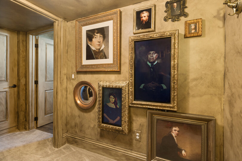 Be greeted by talking portraits