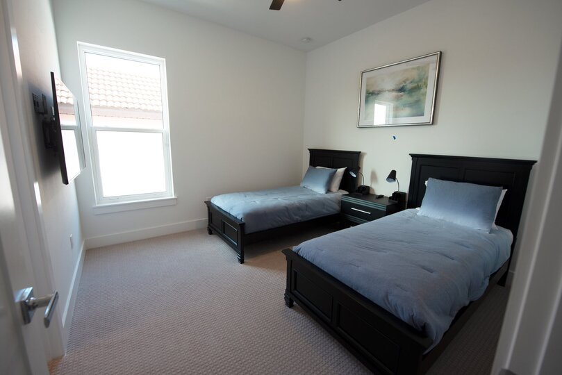 Take a break from all the excitement of the day in one of these twin beds