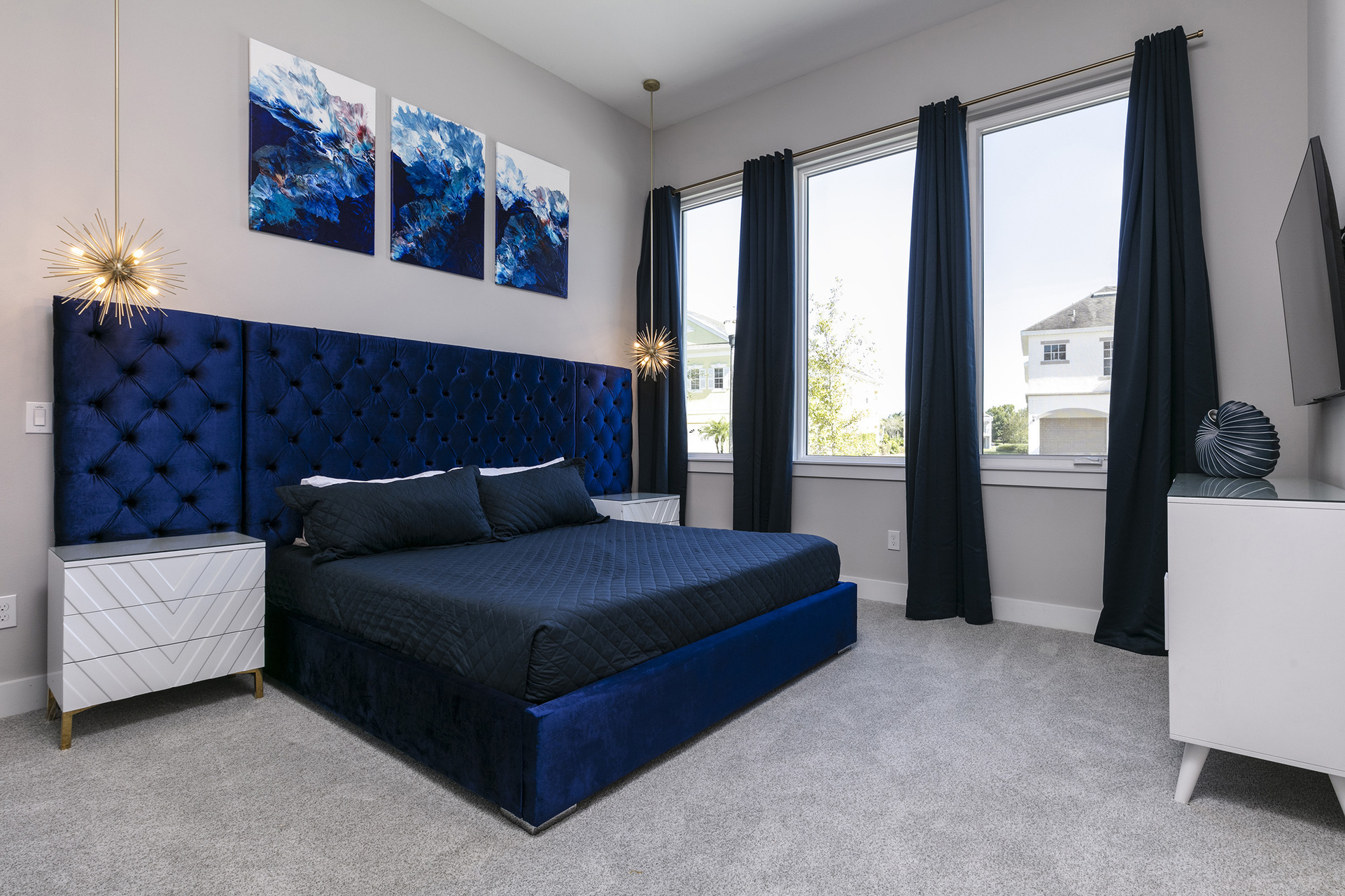 After a day of fun, retreat to this bedroom with a king size bed