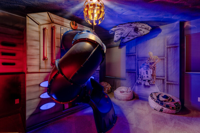 Travel to galaxies far far away in this custom-designed kids bedroom.
