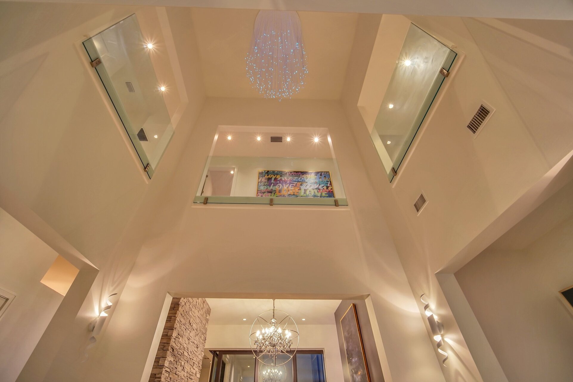 The impressive 2-story foyer greets you as you walk into the home