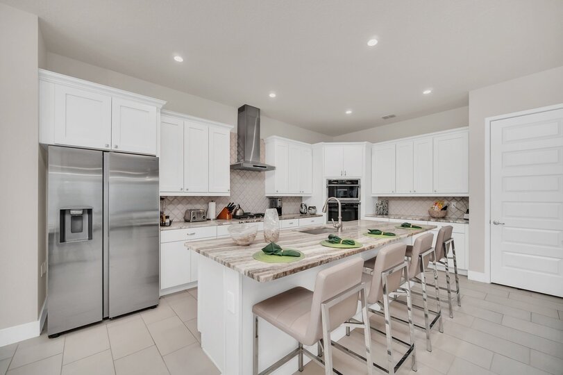 Enjoy casual meals at the breakfast bar or entertain guests in the adjoining dining space