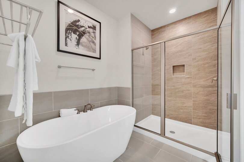 Unwind in the luxurious bath tub, offering a perfect retreat for a relaxing soak at the end of the day
