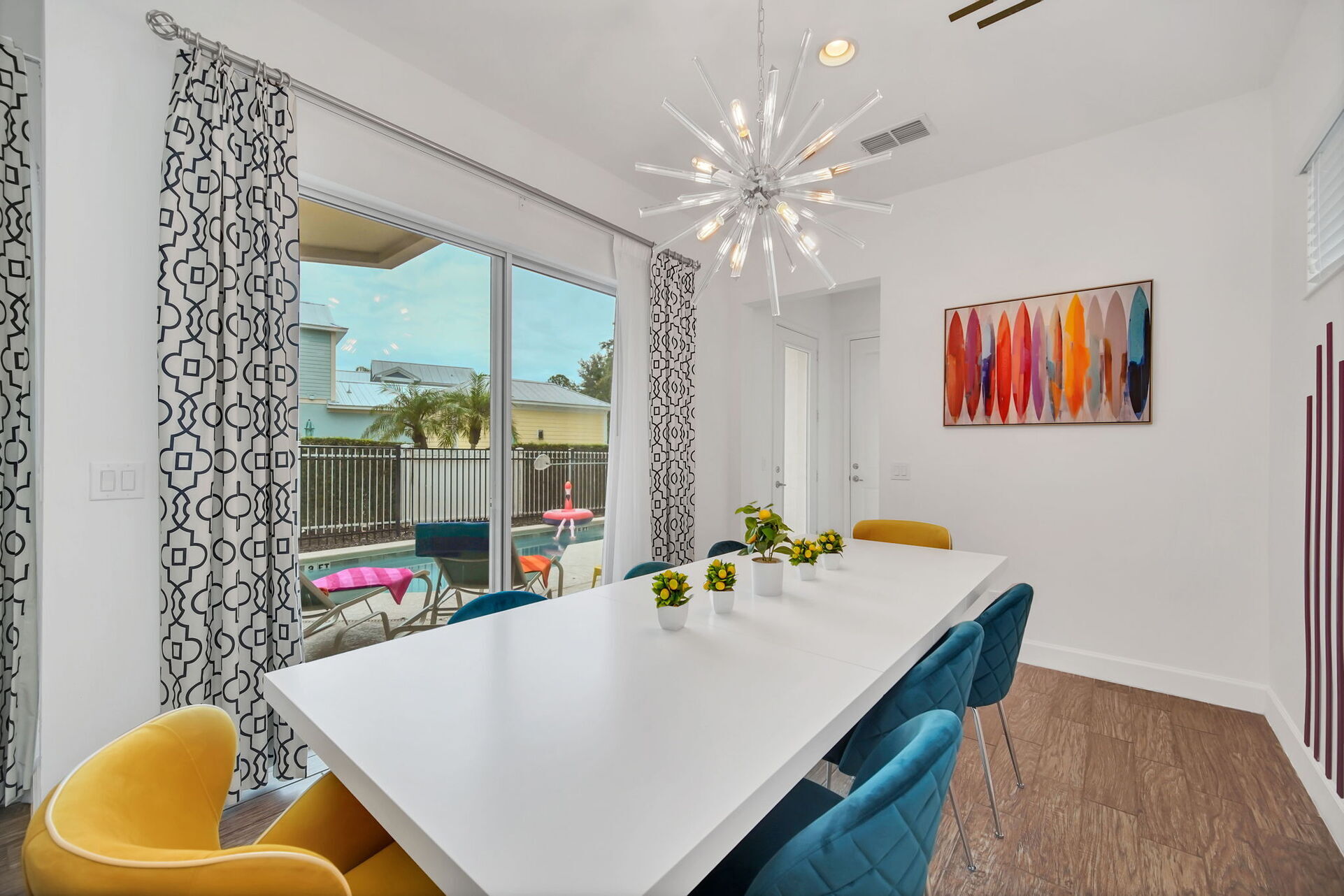 Dine in style at the formal dining table, which comfortably seats 8 guests for any occasion