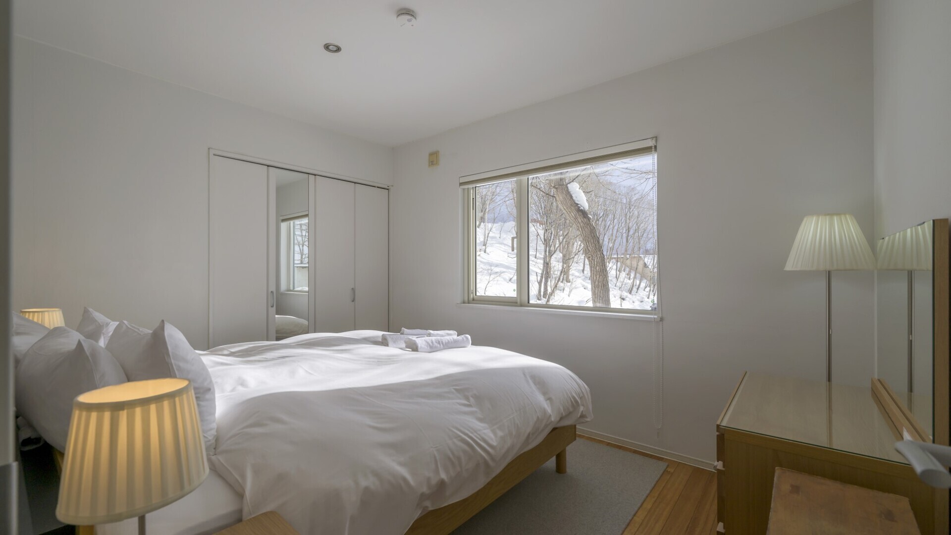 Restful guest bedroom with a view