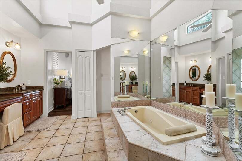 Ensuite includes a walk-in shower, double vanities, and a bathtub