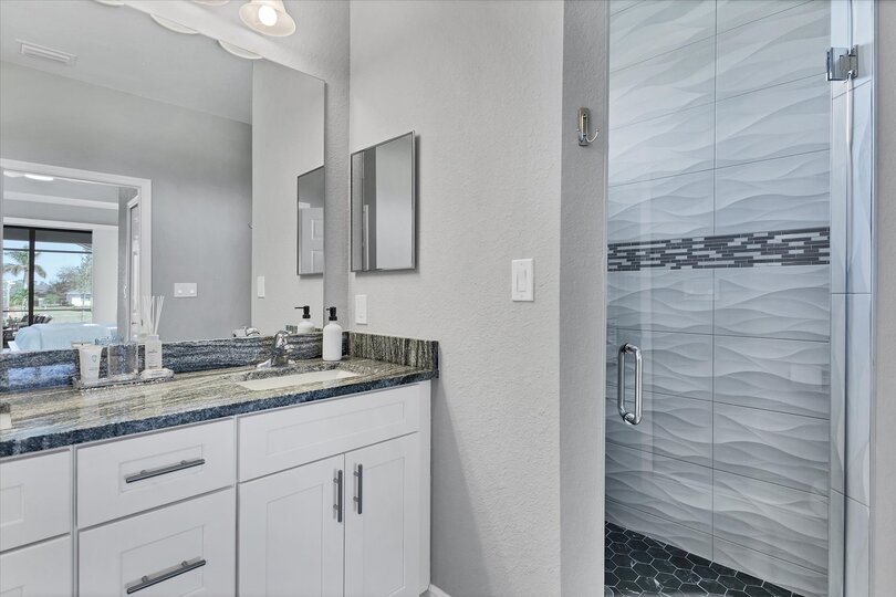 Primary bathroom with walk-in shower, soaking tub and double vanities