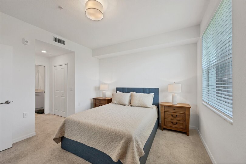 Primary bedroom with queen bed, en suite and 43-inch Smart TV