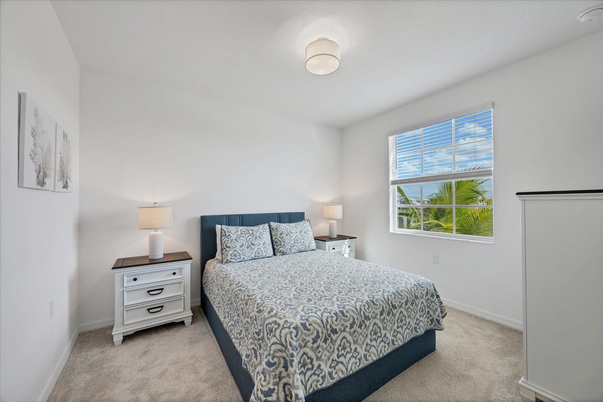 Guest bedroom 1 with queen bed and 43-inch Smart TV
