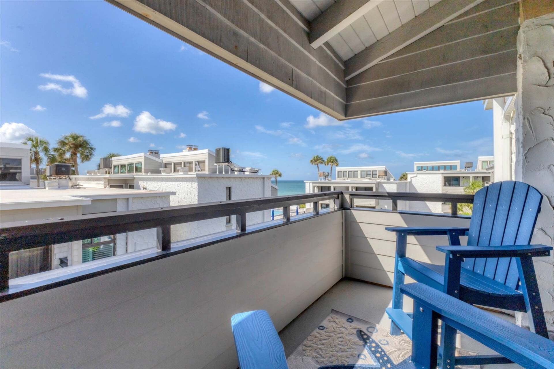 Balcony with view of pool and Gulf