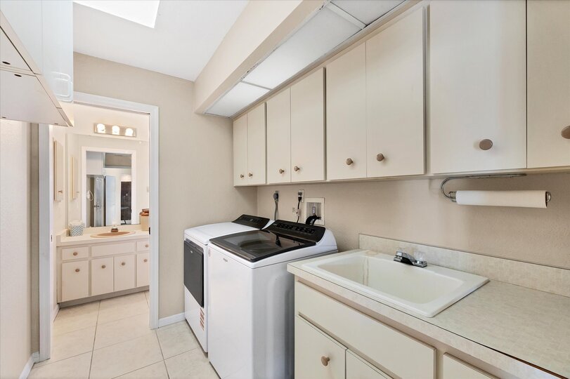 Laundry room with full size washer and dry