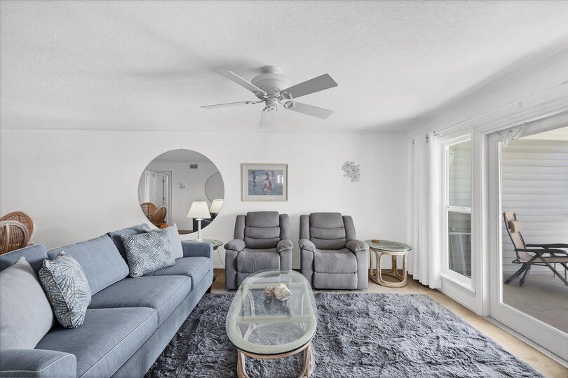 Open living space overlooking the community pool and Myakka River